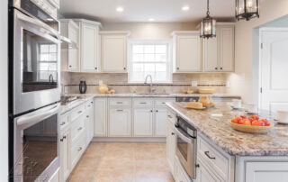 2026 granite countertop kitchen in Colorado featuring natural stone slabs from AMC Stone and Cabinets