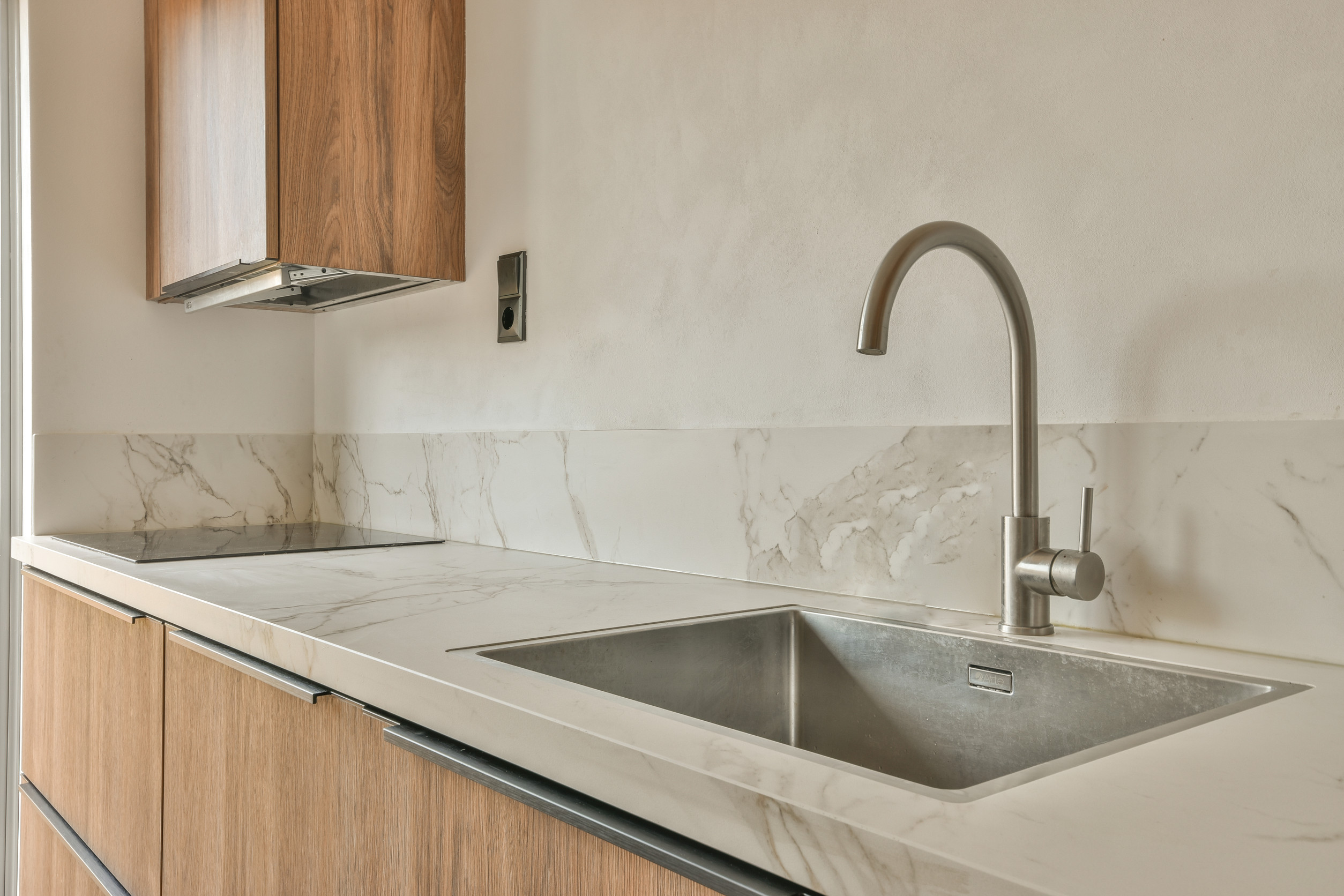 Durable kitchen countertops designed for a busy Colorado household by AMC Stone and Cabinets